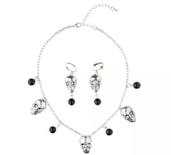 Collier et boucles d'oreilles têtes de mort en argent