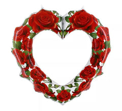 Ballon de 106 cm en forme de coeur avec des roses rouges.