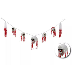 Guirlande tête de mort avec faux sang 180 cm