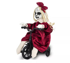 Poupée possédée sur tricycle avec son et mouvement 37x15x22 cm