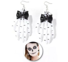 Boucle d'oreille mains squelettes